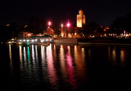 gray concrete tower at nighttime thumbnail