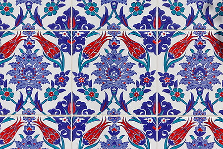 close up photo of purple and red floral tiles thumbnail