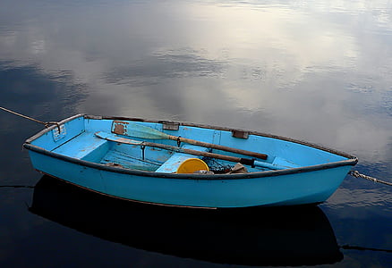 blue boat on waters thumbnail