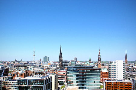 building under blue sky thumbnail