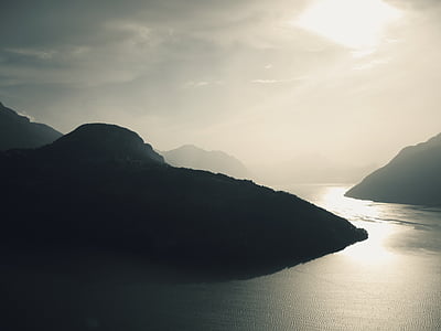 body of water between mountain thumbnail
