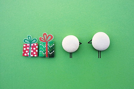 four gift boxes and round ornaments thumbnail