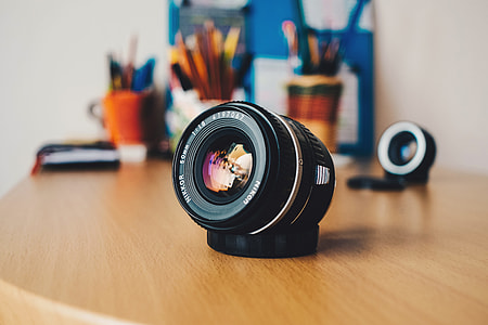 Camera lens on desk thumbnail