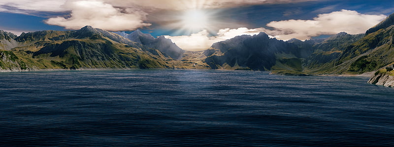 body of water and mountain photo thumbnail