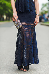 woman wearing blue lace dress and black peep-toe sandal standing on asphalt road during daytime thumbnail