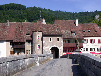 Bridge and buildings in  Saint-Ursanne, Switzerland thumbnail
