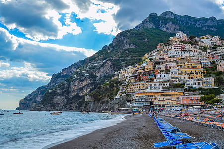 Photography of Beach Near Mountain thumbnail