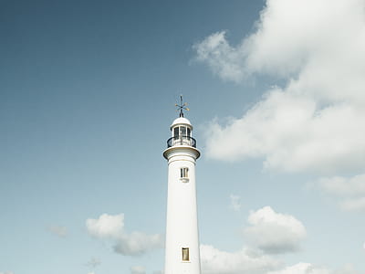 low angle photography of lighthouse thumbnail