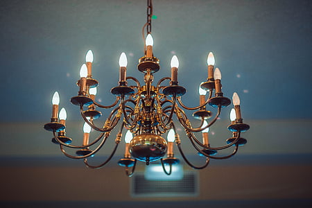 shallow focus photography of brown uplight chandelier thumbnail