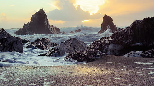 sea waves and rock formation thumbnail