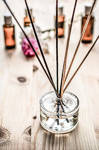 clear glass container and incense sticks thumbnail