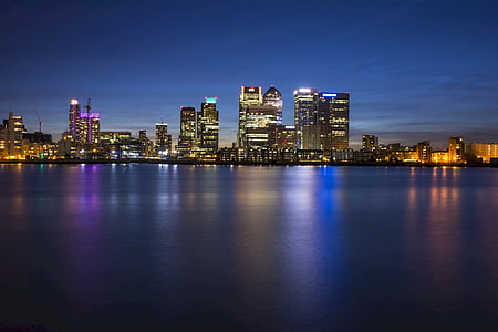 high-rise buildings under blue sky photo thumbnail