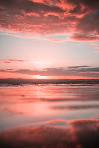 ocean water during pink sunset thumbnail