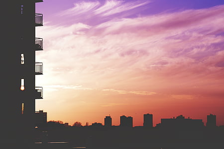 silhouette of buildings during dusk thumbnail