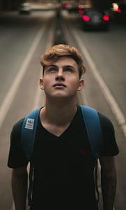 Man Standing in the Middle of Road thumbnail