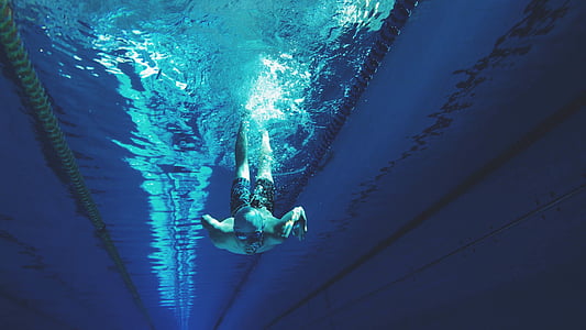 man swim on body of water thumbnail