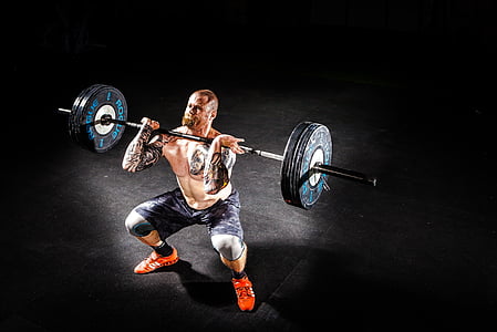 man wearing a black short while lifting a black steel barbell thumbnail