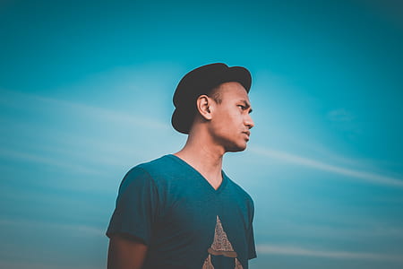 man wearing blue V-neck t-shirt thumbnail