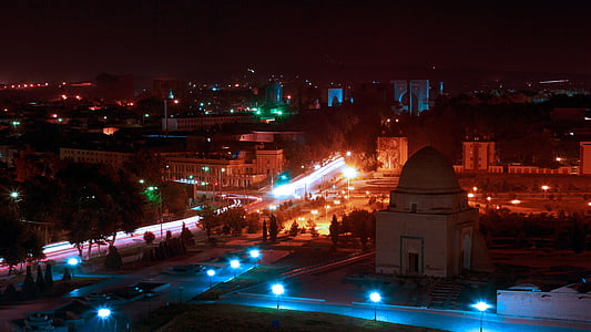 lighted streets and buildings during night time thumbnail