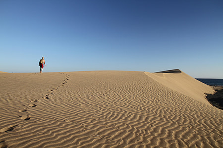 human walking on the desert thumbnail