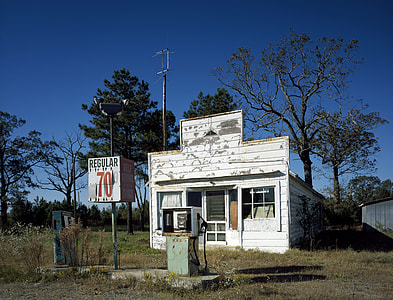 white concrete gasoline station photo thumbnail