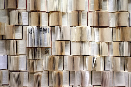 pile of opened books thumbnail