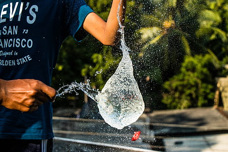 Person in Black Shirt Pouring Water thumbnail
