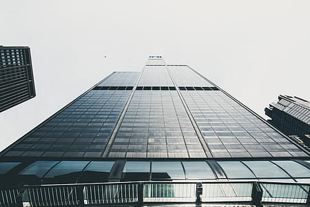 shallow focus photography of black concrete building thumbnail