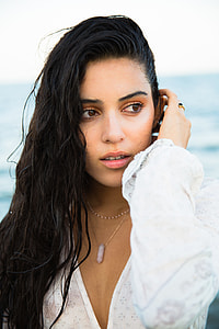 woman in white V-neck long-sleeved shirt thumbnail