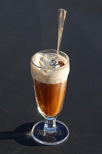 clear footed glass on top black surface thumbnail
