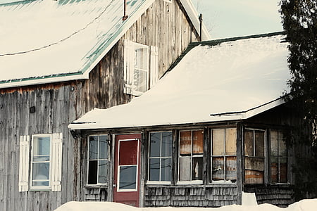 snow covered house at daytime thumbnail