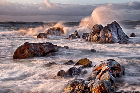 sea rocks during daytime thumbnail