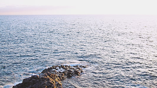 aerial photo of rocks on body of water thumbnail