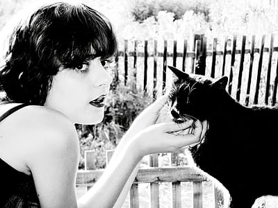 woman holding cat thumbnail