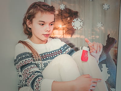 girl in white and gray sweater thumbnail