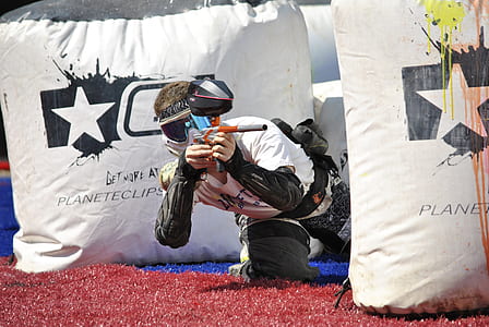 man shooting a paintball thumbnail
