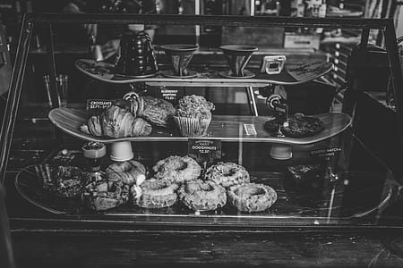 foods in clear glass display shelf thumbnail
