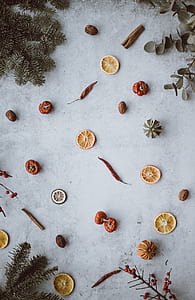 assorted fruit slices and chili with green leaves thumbnail