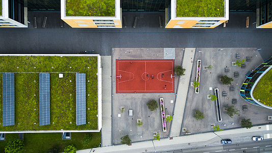 aerial view of highways with cars and buildings thumbnail