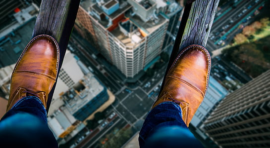 pair of brown dress shoes thumbnail
