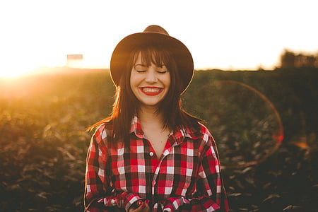 woman wearing sport shirt and hat thumbnail
