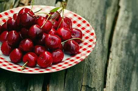red cherries on plate thumbnail