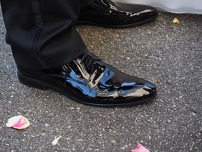 person wearing black shoes thumbnail
