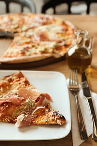 Pizza with Prosciutto on the white plate thumbnail