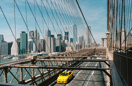 yellow car on bridge thumbnail