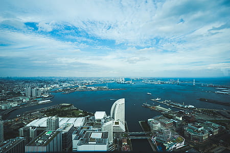 high-rise buildings near sea thumbnail