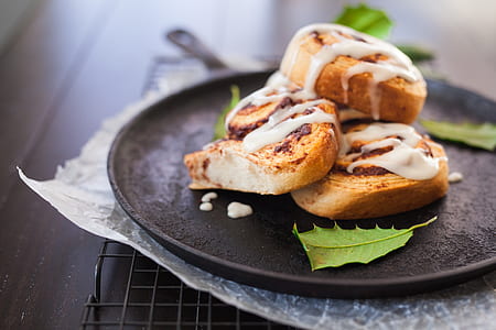 tilt-shift photography of cooked meat on black skillet with white toppings thumbnail