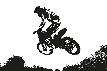 grayscale photography of man riding motocross bike thumbnail