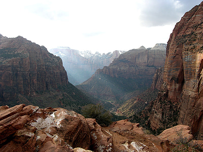 light ray between brown rock formations thumbnail