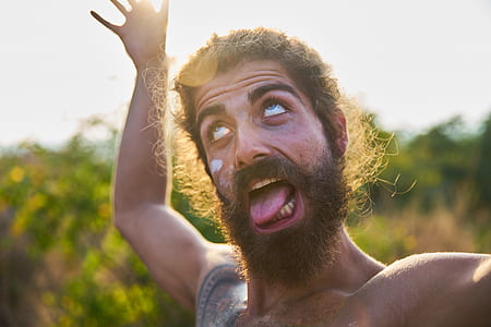 man raising right hand thumbnail